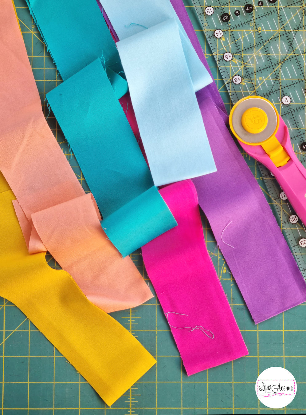 Precut fabric strips ready for a strip quilt