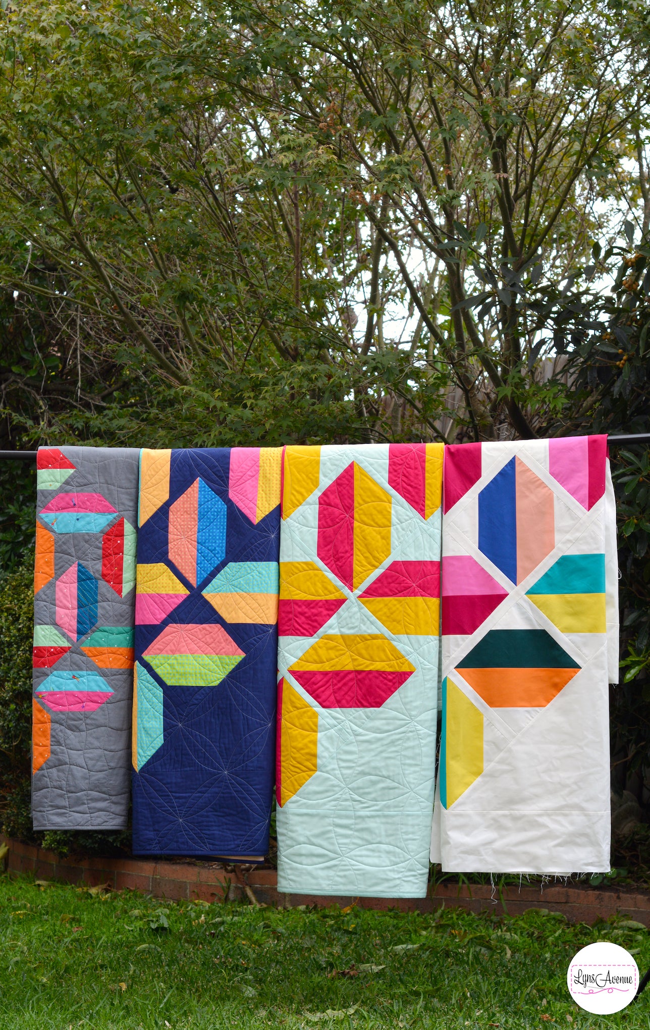 four flourishing quilt hanging